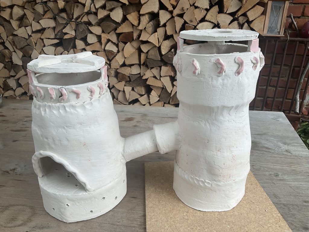 Zweiflammiger Ofen mit Holzfeuerung